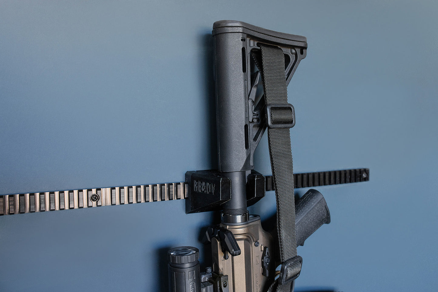 Buffer tube wall mount for gun wall